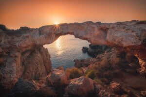 View of cape and natural arch bridge.